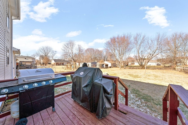 wooden terrace with grilling area