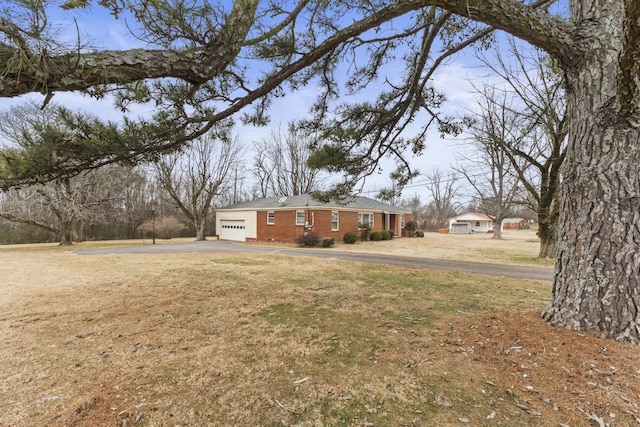 view of yard featuring a garage