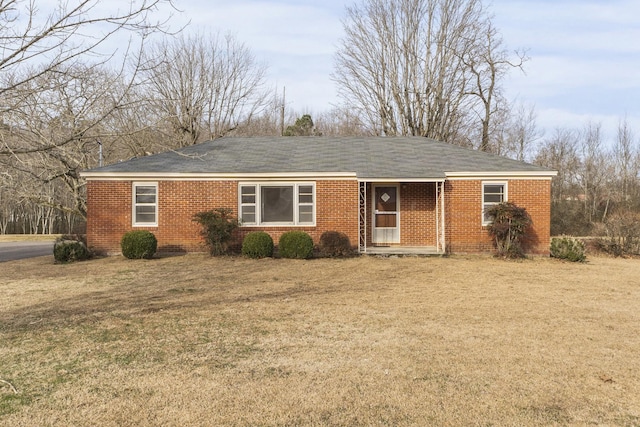 ranch-style house with a front yard