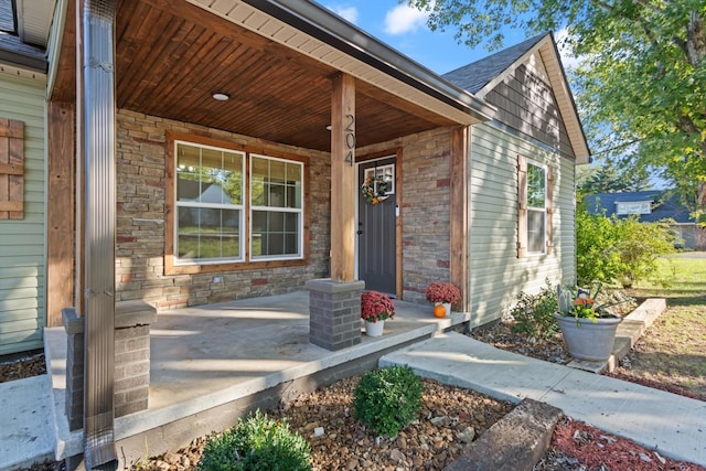 entrance to property with covered porch