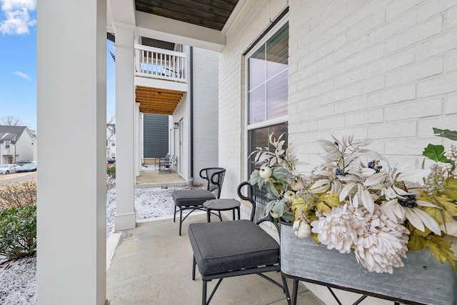 view of patio featuring a porch