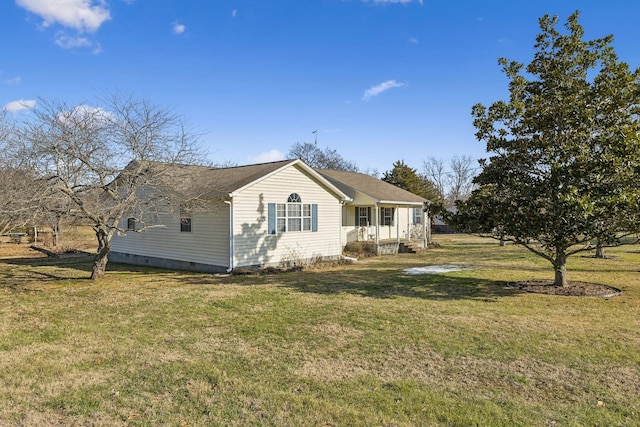 view of property exterior with a lawn