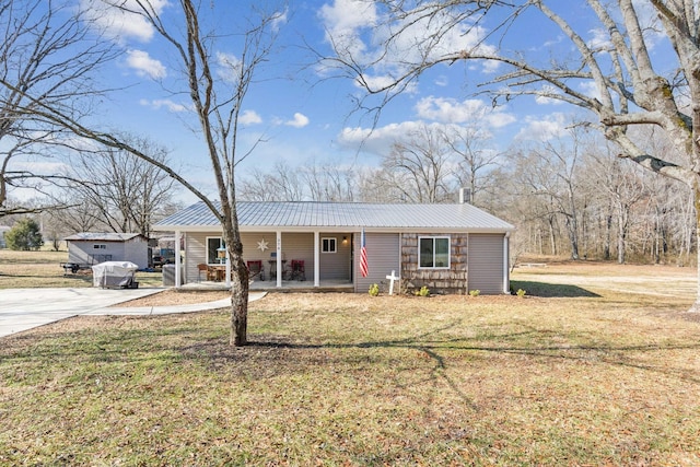 ranch-style house with a front lawn and a porch