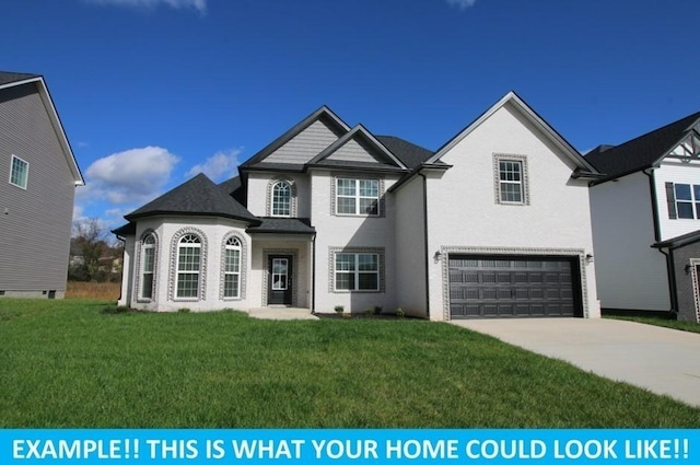 view of front of house featuring a garage and a front lawn