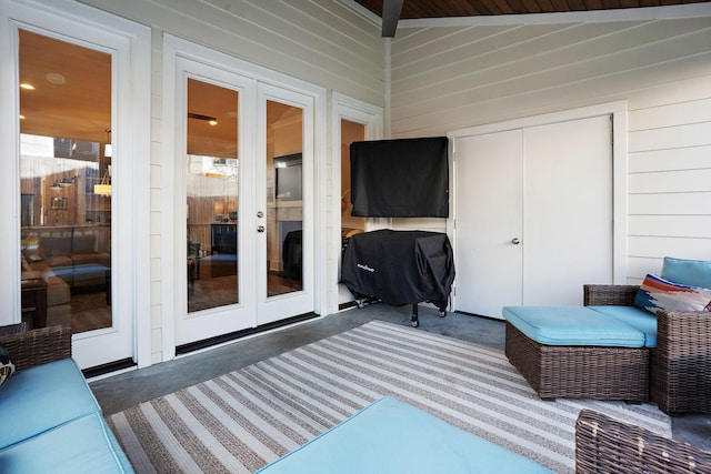 exterior space featuring french doors and a grill