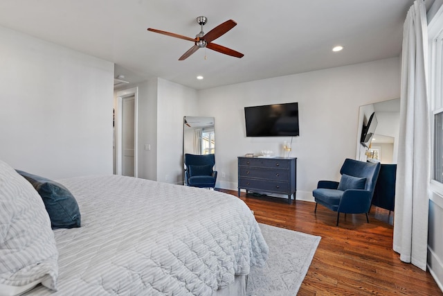 bedroom featuring dark hardwood / wood-style floors and ceiling fan