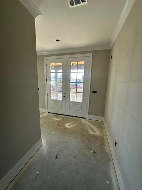 doorway to outside with crown molding and french doors