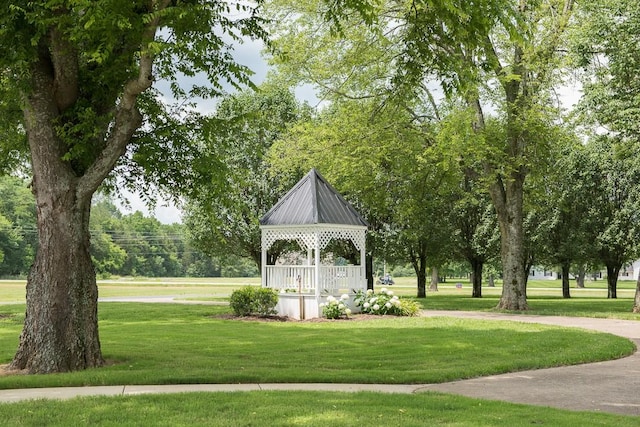 view of community with a gazebo and a lawn