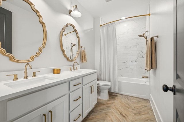 full bathroom with vanity, parquet floors, shower / tub combo, and toilet