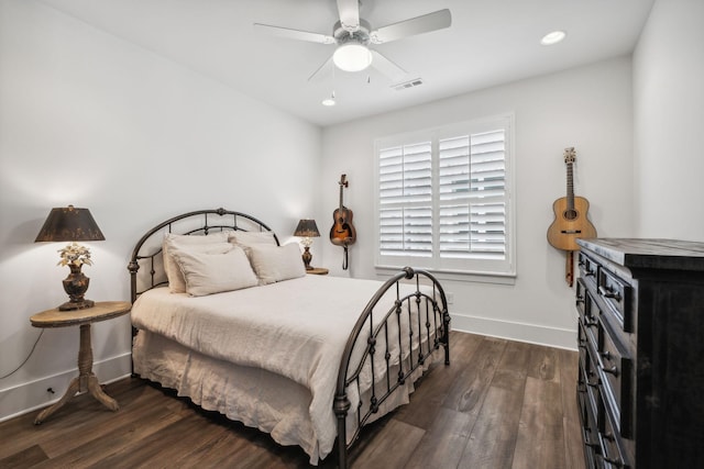 bedroom featuring dark wood-type flooring and ceiling fan