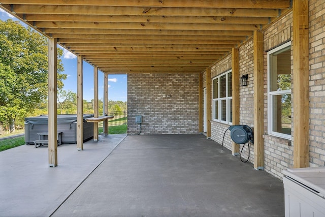 view of patio / terrace featuring a hot tub