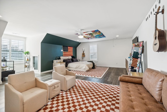 bedroom with hardwood / wood-style flooring and ceiling fan