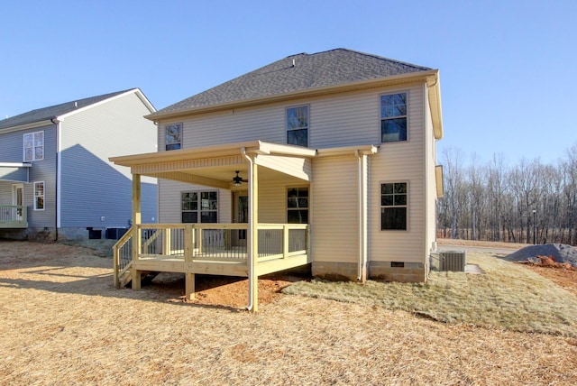 back of house with ceiling fan and central AC unit