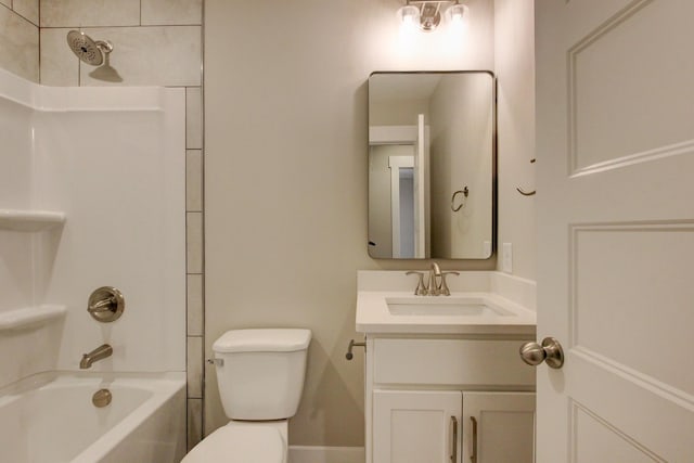 full bathroom with vanity, bathtub / shower combination, and toilet