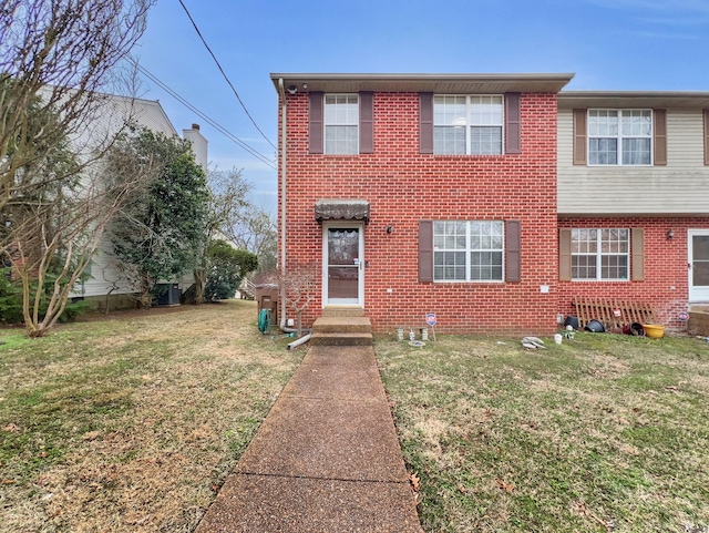 view of front of home with a front lawn