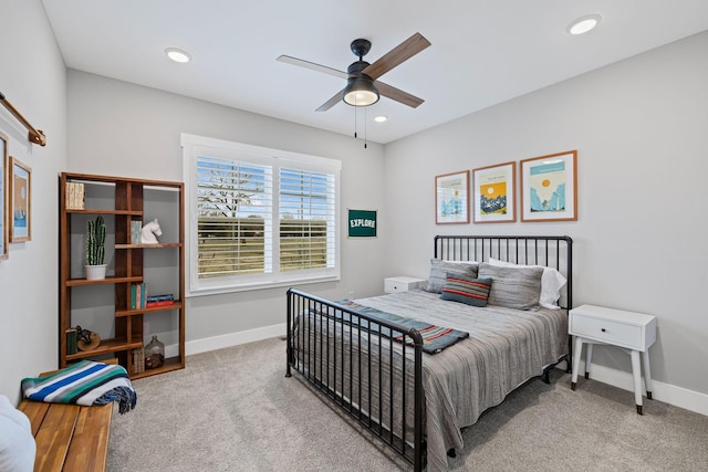 carpeted bedroom featuring ceiling fan