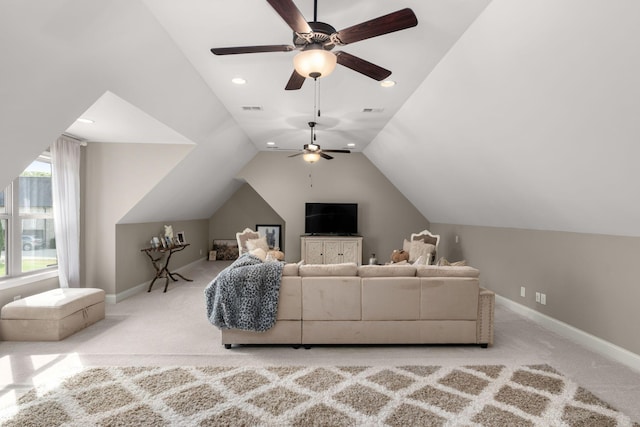 carpeted living room with vaulted ceiling and ceiling fan