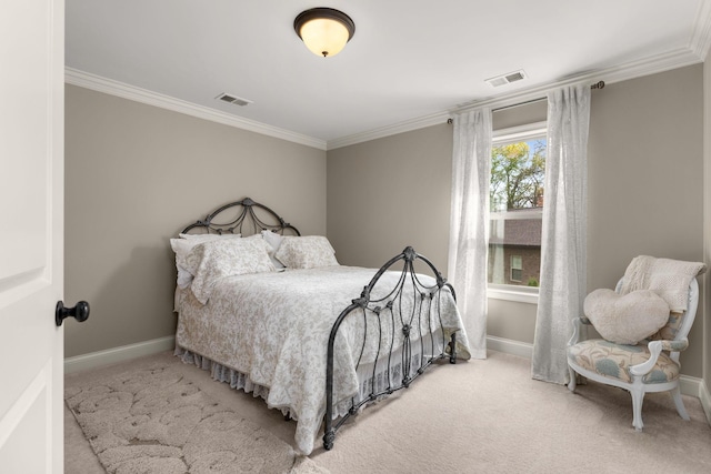 carpeted bedroom featuring crown molding