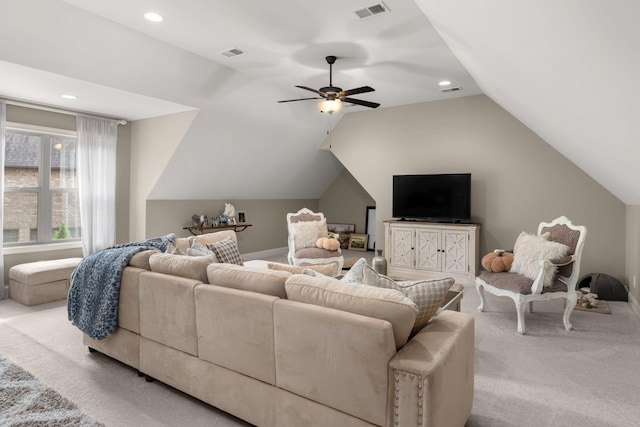 living room with lofted ceiling, light carpet, and ceiling fan