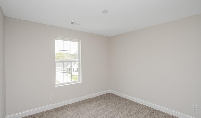 view of carpeted spare room