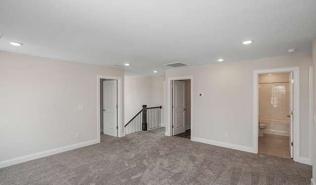 unfurnished room with carpet