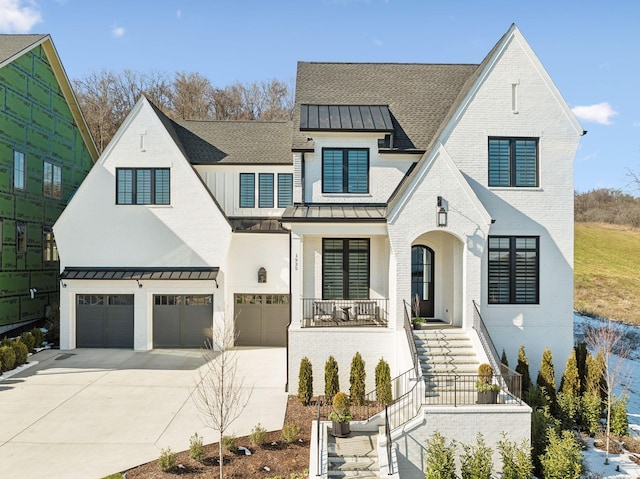 view of front facade featuring a garage and covered porch