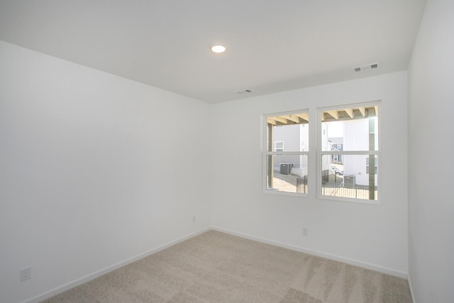 view of carpeted spare room