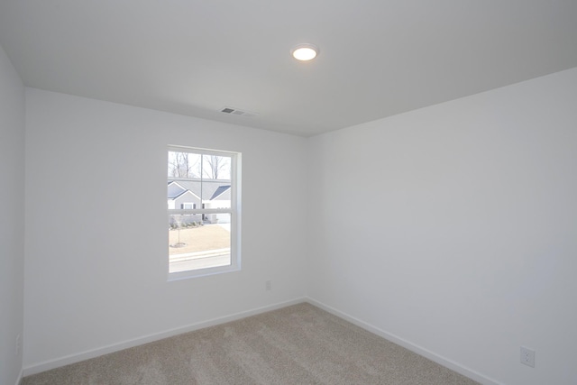 view of carpeted spare room