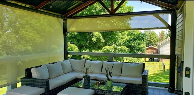 sunroom with lofted ceiling