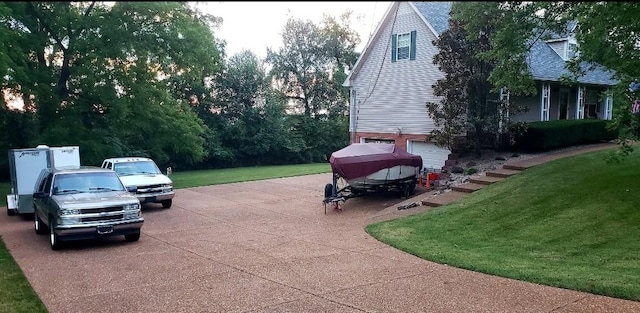 view of patio featuring a garage