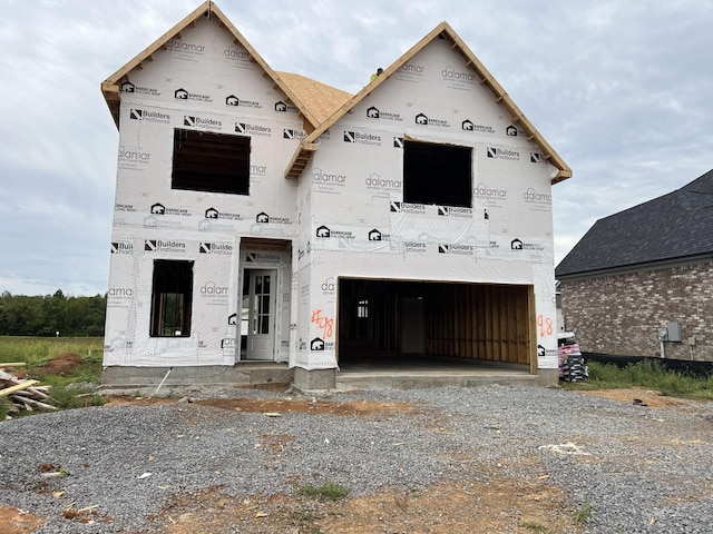 property in mid-construction featuring a garage