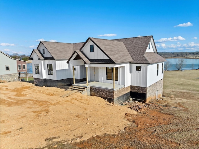 modern farmhouse with a water view