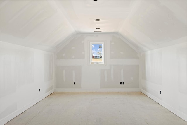 bonus room featuring lofted ceiling