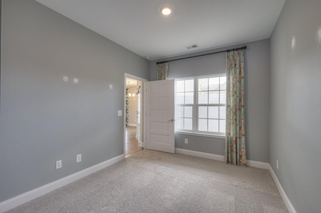 empty room featuring carpet