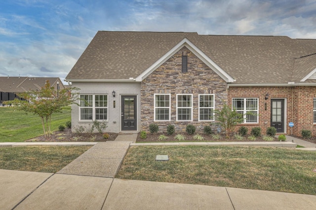 view of front of home with a front lawn