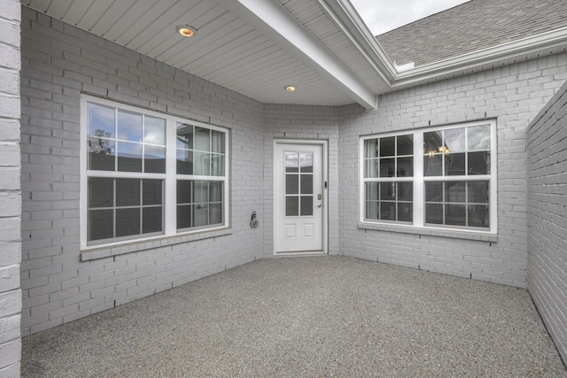 entrance to property with a patio area