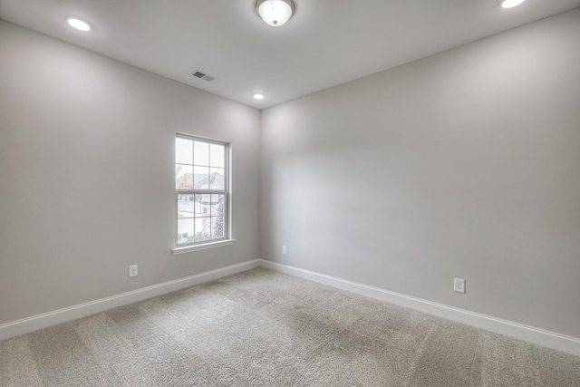 empty room featuring carpet flooring