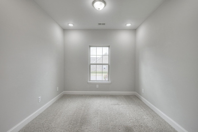 empty room with carpet floors