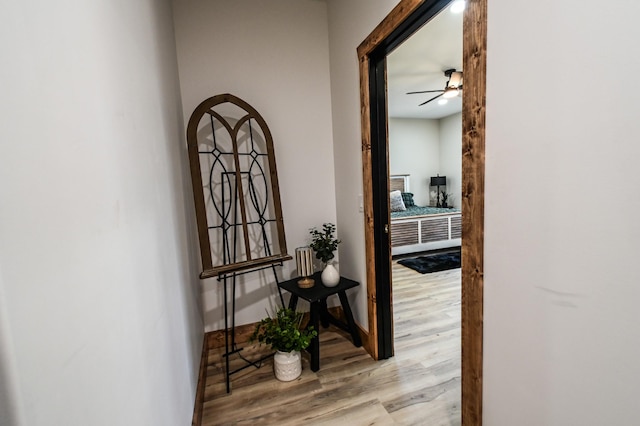 hall with light hardwood / wood-style floors