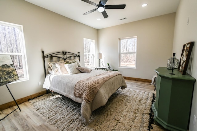 bedroom featuring ceiling fan and light wood-type flooring