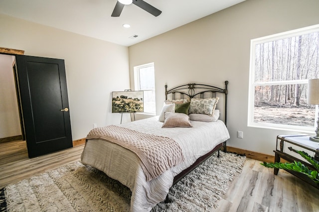 bedroom featuring ceiling fan and light wood-type flooring