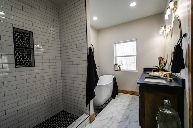 bathroom featuring vanity and separate shower and tub