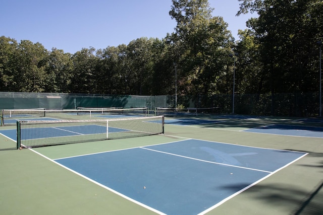 view of tennis court with basketball court