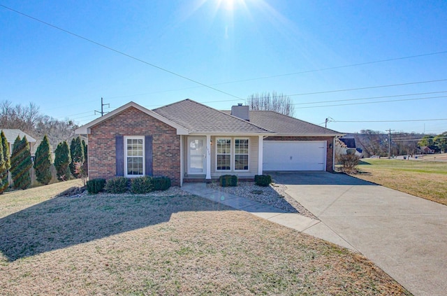 ranch-style home with a garage and a front lawn