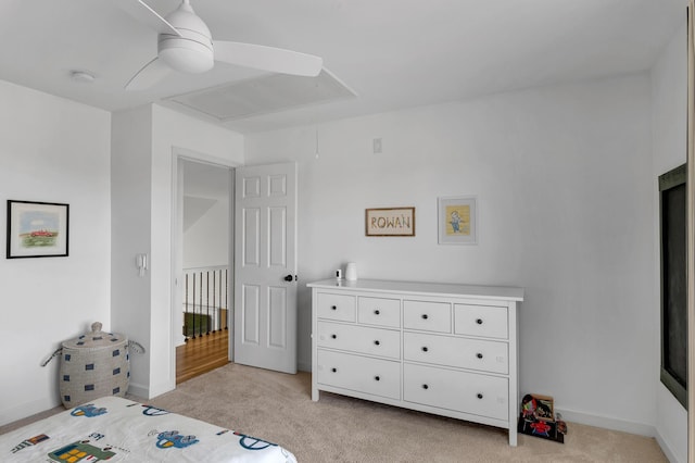 bedroom featuring ceiling fan and light colored carpet