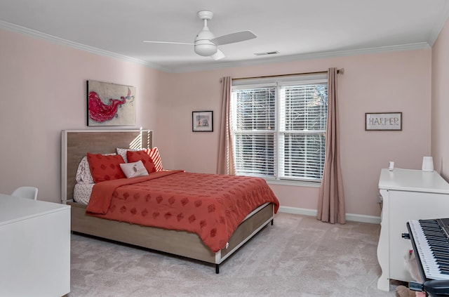 bedroom with light colored carpet, ornamental molding, and ceiling fan