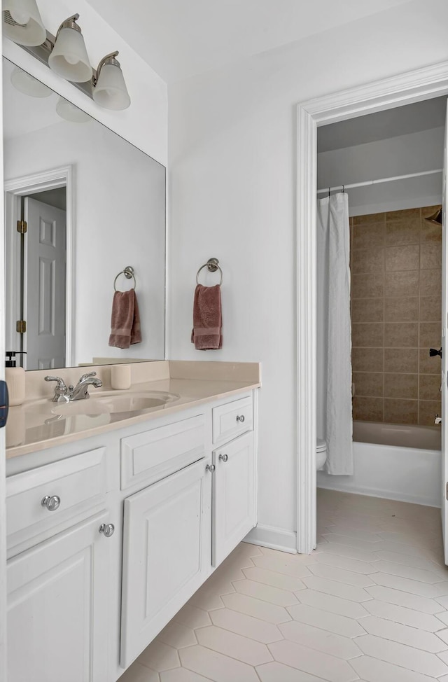 bathroom with shower / tub combo with curtain and vanity