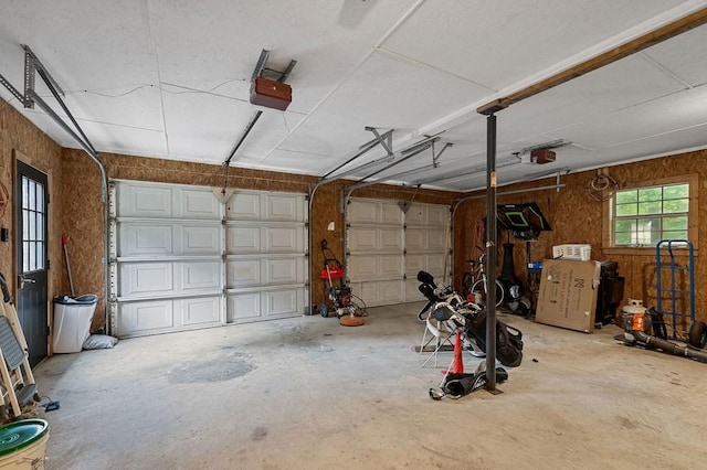 garage featuring a garage door opener