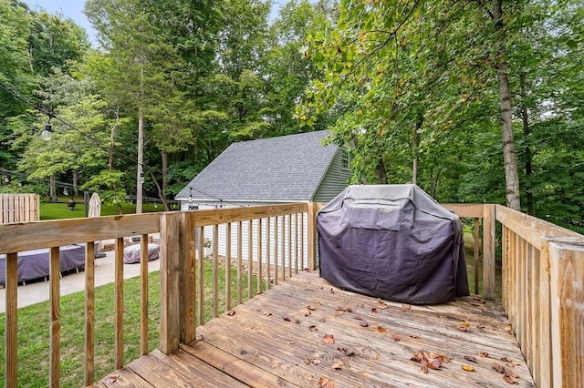 wooden deck with grilling area