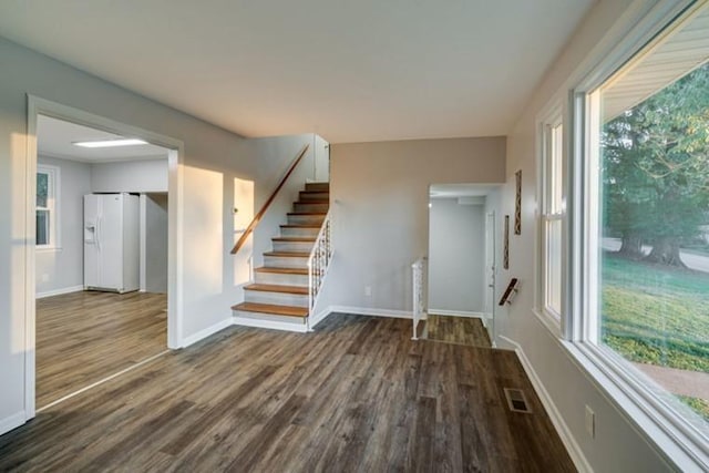 interior space with dark wood-type flooring